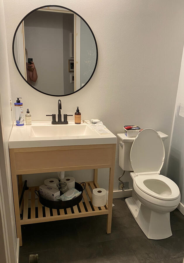 Half Bath Remodel Progress Half bath remodel progress with new tile flooring and small custom build oak vanity.