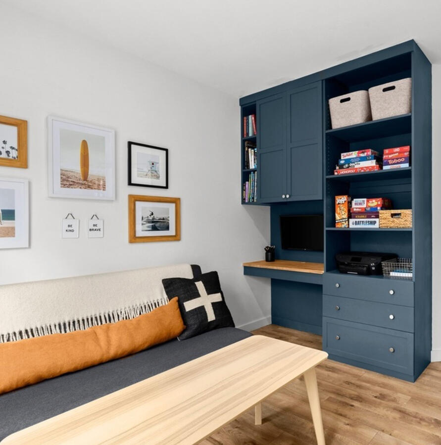 Kids Playroom with Builtin Desk Area Kids playroom with builtin desk area and storage.